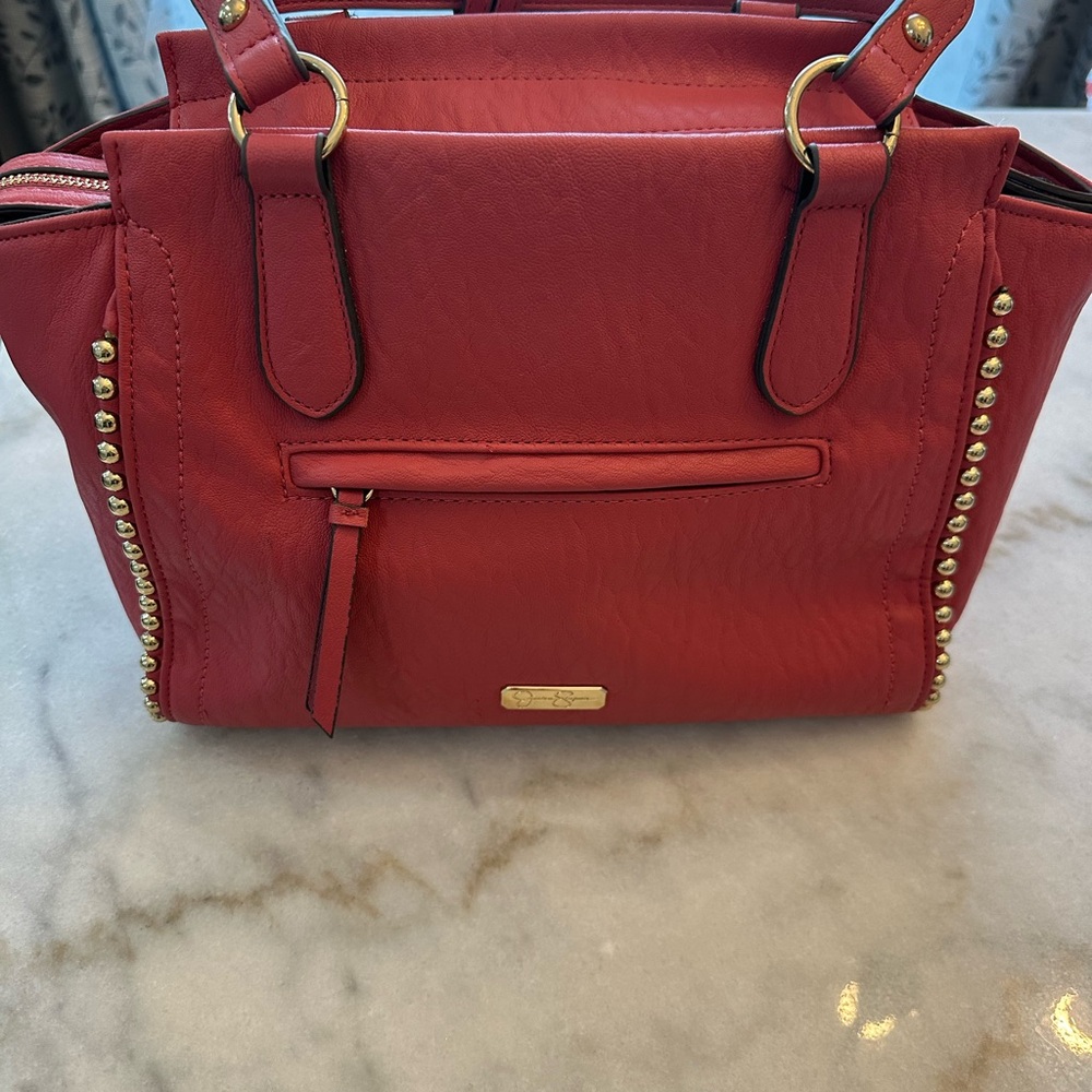 Elegant Red Handbag with Gold Accents